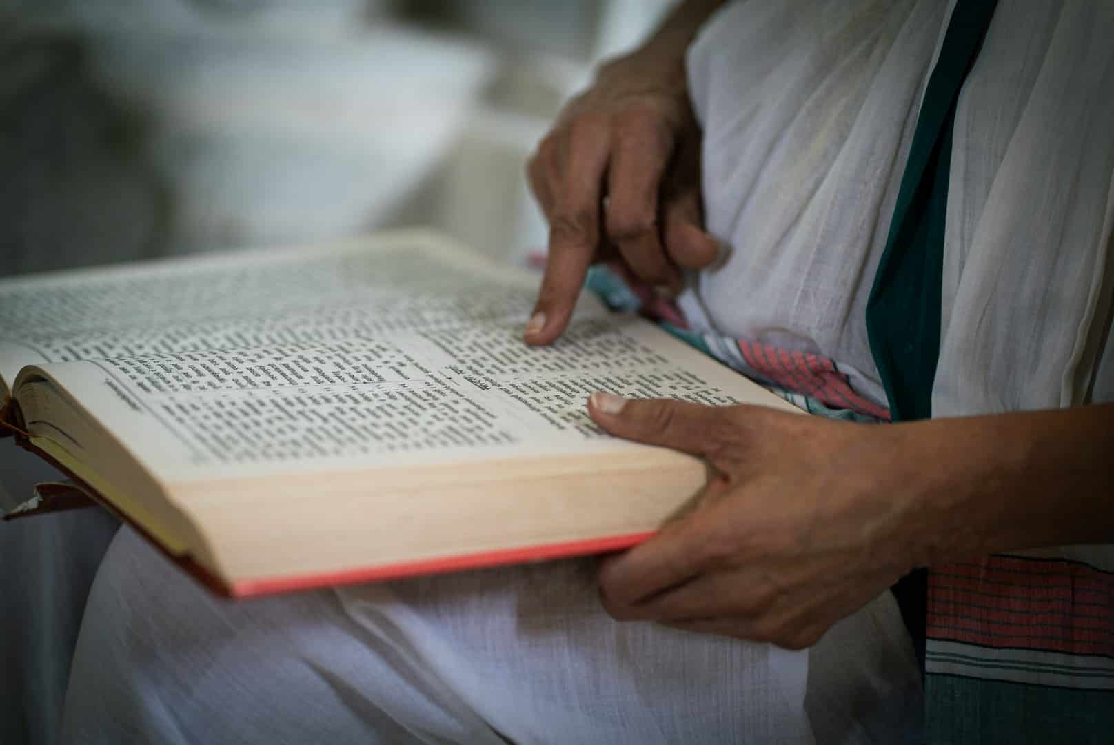 Brahmin reading a book in devanagari